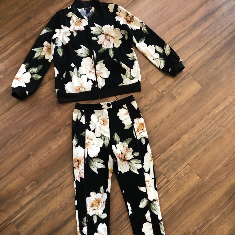 Floral bomber jacket and cropped pants set.